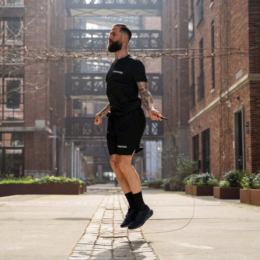 Skipping with the speedrope between brick buildings