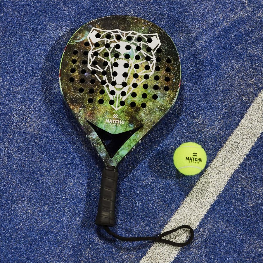 Bear racket lying on a blue padel court