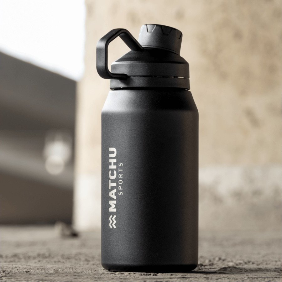 The black MATCHU metal bottle on concrete